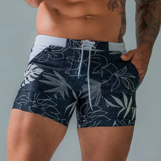 a hot gay man in blue Wild Island Flirt Swim Trunks - pridevoyageshop.com - gay men’s underwear and swimwear