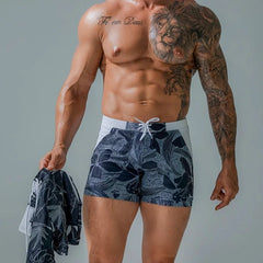 a hot gay man in light blue Wild Island Flirt Swim Trunks - pridevoyageshop.com - gay men’s underwear and swimwear