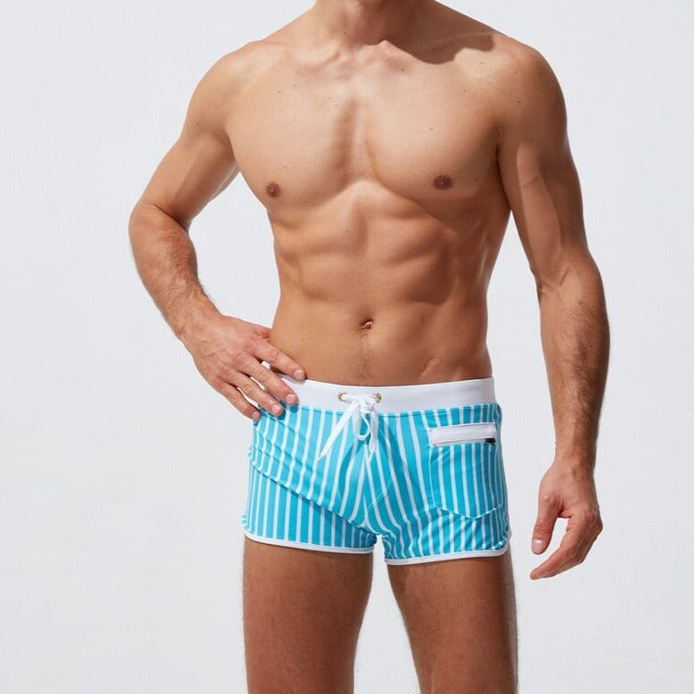 sexy gay man in blue Gay Swimwear | Men' s Striped Swim Trunks With Zipper Pocket - pridevoyageshop.com - gay men’s underwear and swimwear