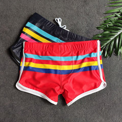 details of red Gay Swimwear & Beachwear | Men's Pride Stripe Swim Trunks - pridevoyageshop.com - gay men’s underwear and swimwear