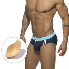 sexy gay man in blue Gay Swimwear | Side Stripe Swim Briefs- pridevoyageshop.com - gay men’s underwear and swimwear