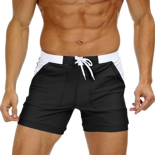 hot gay man in black Gay Swimwear & Beachwear | Drawstring Boxer Swim Trunks - pridevoyageshop.com - gay men’s underwear and swimwear