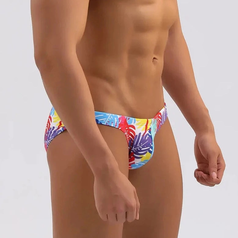 a hot gay man in Men's Tropical Leaves Skinny Swim Briefs - pridevoyageshop.com - gay men’s underwear and swimwear