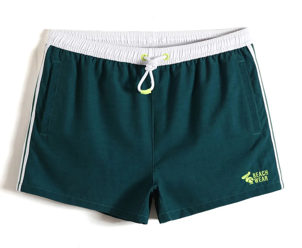 green Wavy Lines Board Shorts - pridevoyageshop.com - gay men’s underwear and swimwear