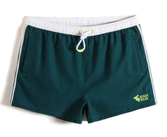 green Wavy Lines Board Shorts - pridevoyageshop.com - gay men’s underwear and swimwear