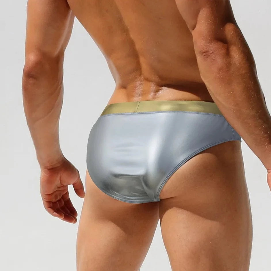 a hot gay man in silver Men's Liquid Metallic Swim Briefs - pridevoyageshop.com - gay men’s underwear and swimwear