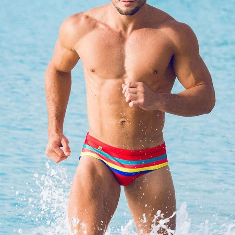 hot gay man in red Gay Swimwear | Vibrant Stripes Swim Briefs- pridevoyageshop.com - gay men’s underwear and swimwear