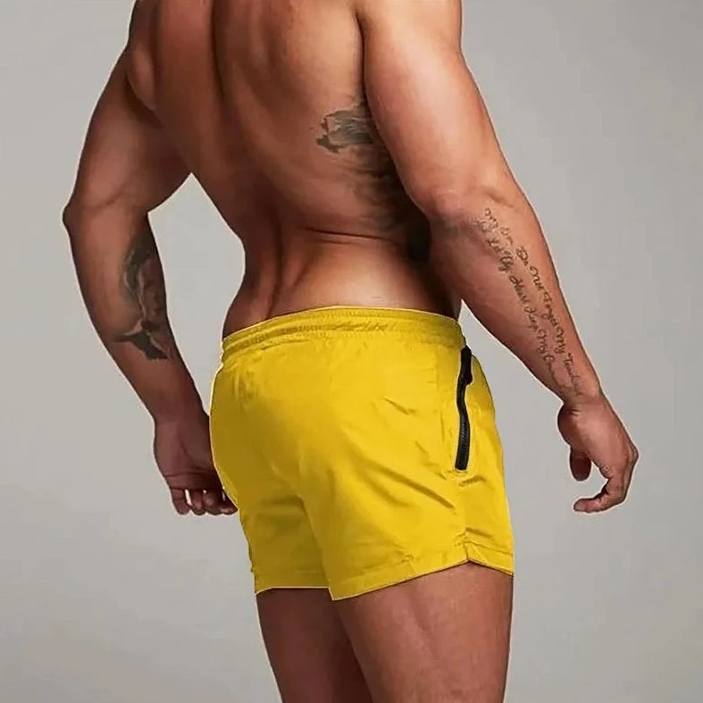 a hot gay man in yellow Men's Solid Color Pocketed Running Shorts - pridevoyageshop.com - gay men’s underwear and swimwear