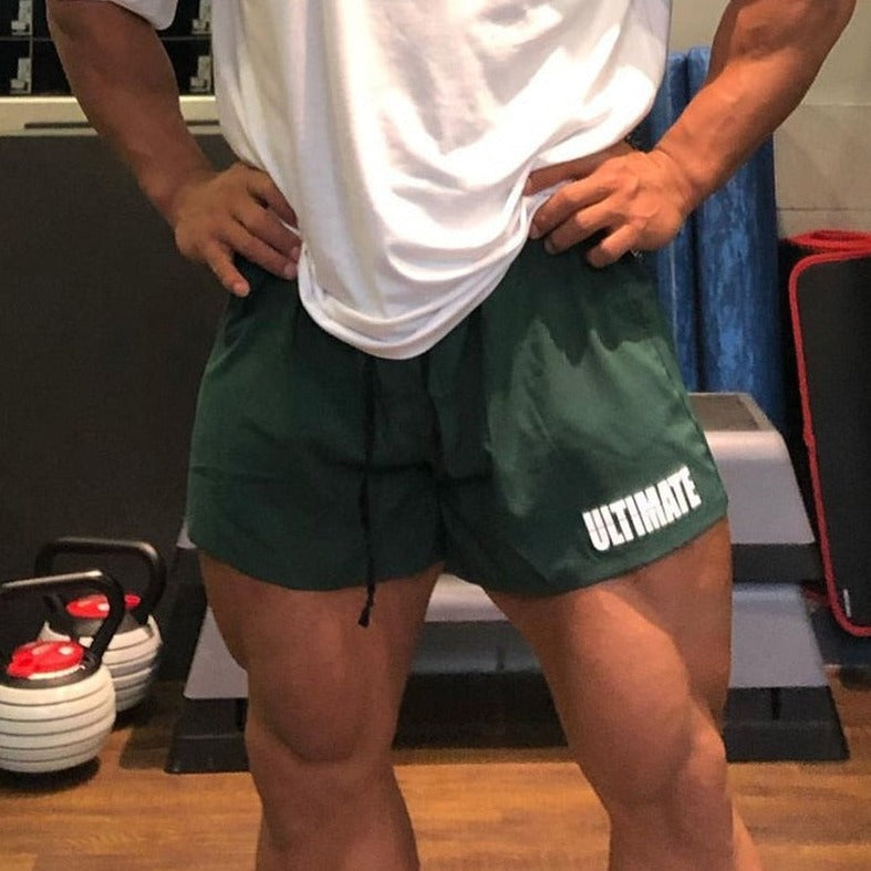 gay hunk in green Mens Ultra Power Training Shorts | Gay Shorts - Men's Activewear, gym short, sport shorts, running shorts- pridevoyageshop.com