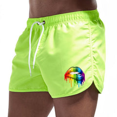 green Gay Swimwear & Beachwear | Rainbow Lips Print Board Shorts - pridevoyageshop.com - gay men’s underwear and swimwear