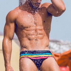 hot gay man in black Gay Swimwear | Vibrant Stripes Swim Briefs- pridevoyageshop.com - gay men’s underwear and swimwear