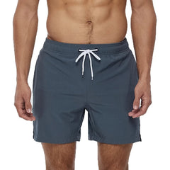 a hot gay man in gray Solid Color Pocketed Board Shorts - pridevoyageshop.com - gay men’s underwear and swimwear