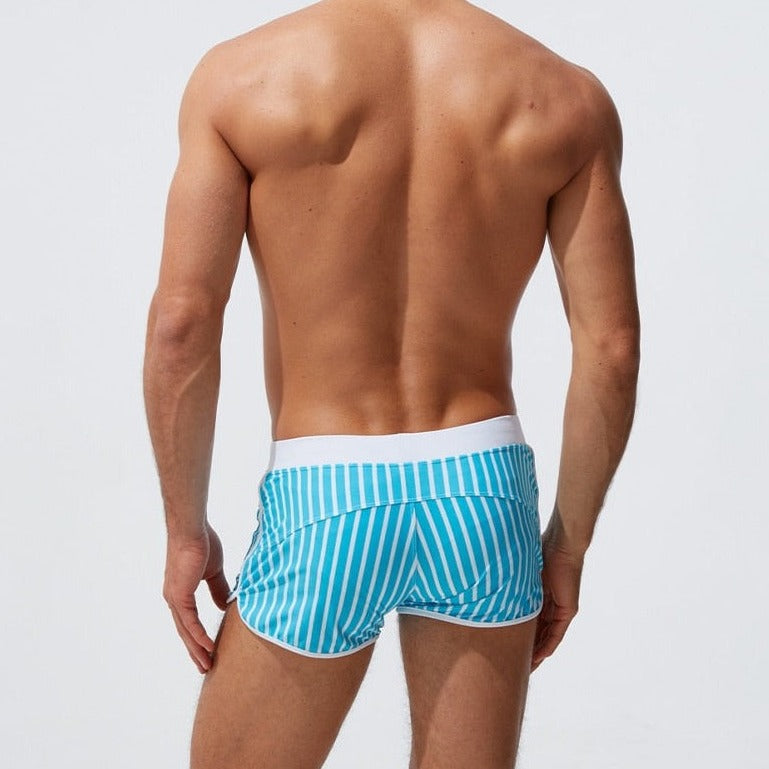 sexy gay man in blue Gay Swimwear | Men' s Striped Swim Trunks With Zipper Pocket - pridevoyageshop.com - gay men’s underwear and swimwear