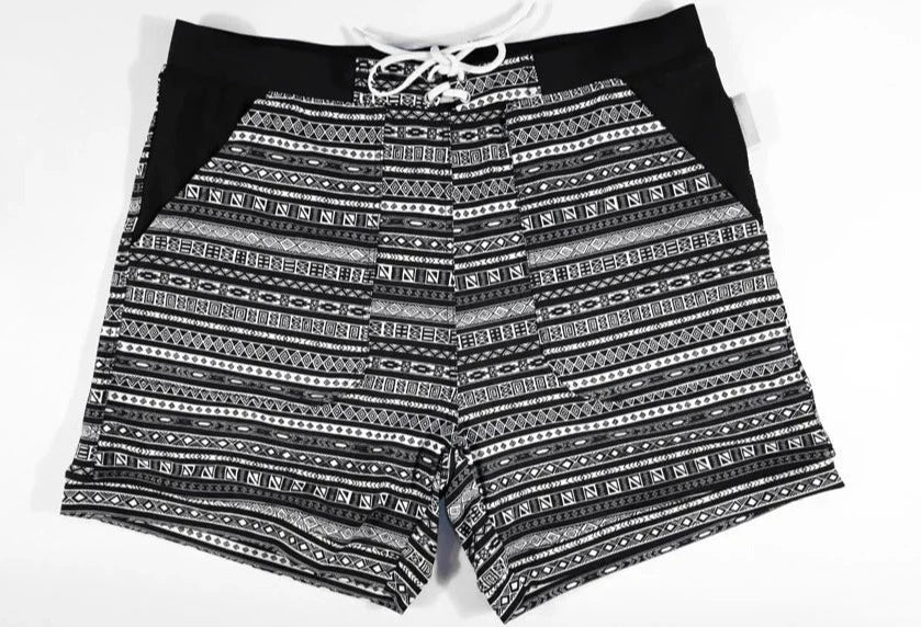 details of a hot man in Aztec Tribal Tight Board Shorts - pridevoyageshop.com - gay men’s underwear and swimwear