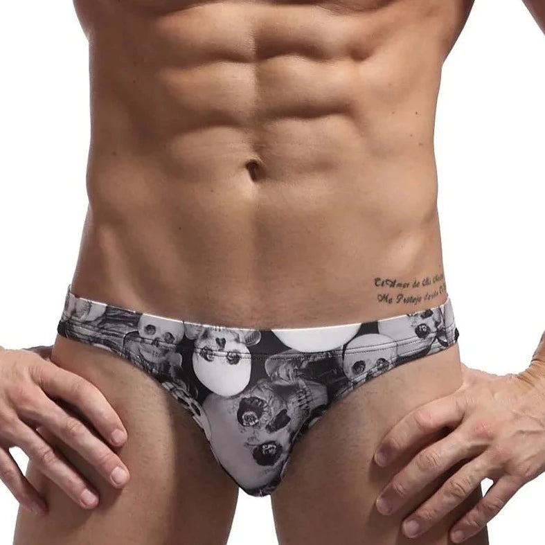 a hot gay man in black Men's Skinny Skull Print Swim Briefs - pridevoyageshop.com - gay men’s underwear and swimwear