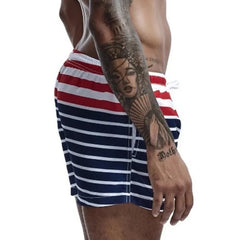 a hot gay man in Men's Sailor Striped Board Shorts - pridevoyageshop.com - gay men’s underwear and swimwear