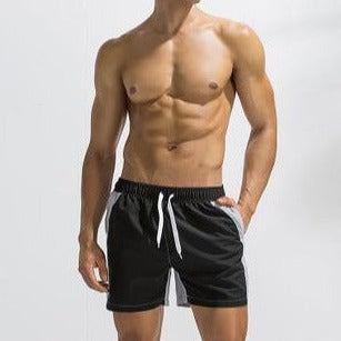 hot gay man in black Gay Swimwear & Beachwear | Mens Two-Toned Board Shorts - pridevoyageshop.com - gay men’s underwear and swimwear