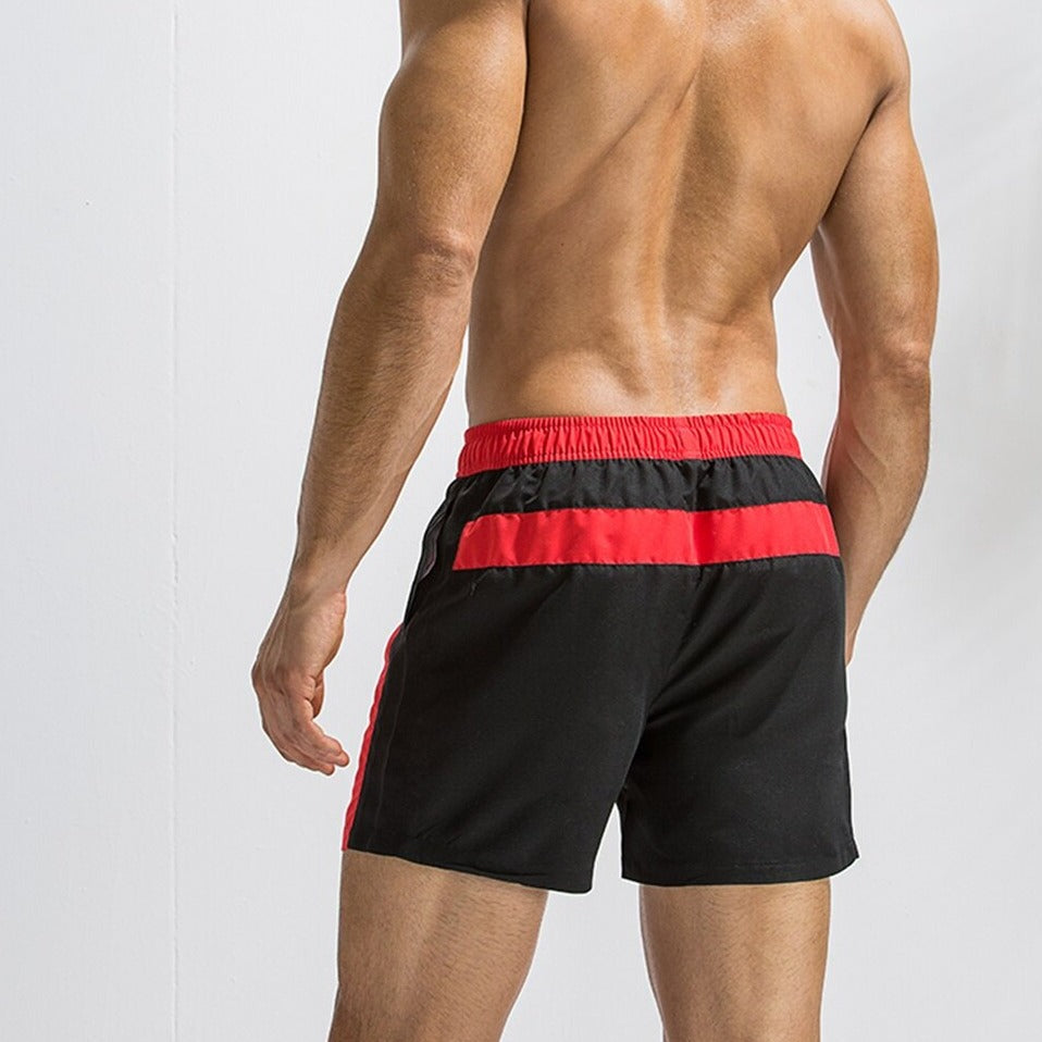 hot gay man in red Gay Swimwear & Beachwear | Mens Two-Toned Board Shorts - pridevoyageshop.com - gay men’s underwear and swimwear