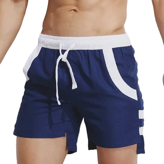 a hot man in blue Beachfront Bold Board Shorts - pridevoyageshop.com - gay men’s underwear and swimwear