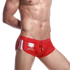 a sexy gay man in red Men's Athletic Square Cut Swim Trunks - pridevoyageshop.com - gay men’s underwear and swimwear