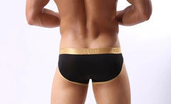 a hot gay man in black COCKCON Barely There Briefs - pridevoyageshop.com - gay men’s underwear and activewear