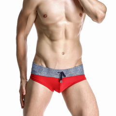 a hot gay man in red Men's Wide Gray Band Swim Briefs - pridevoyageshop.com - gay men’s underwear and swimwear