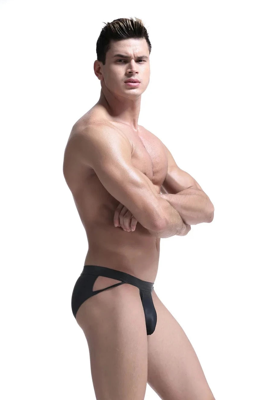 a hot gay man in Kinky Faux Leather Sideshow Briefs - pridevoyageshop.com - gay men’s underwear and swimwear
