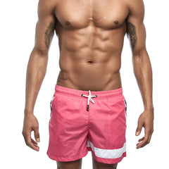 a hot gay man in pink Reflex Racer Board Shorts - pridevoyageshop.com - gay men’s underwear and swimwear