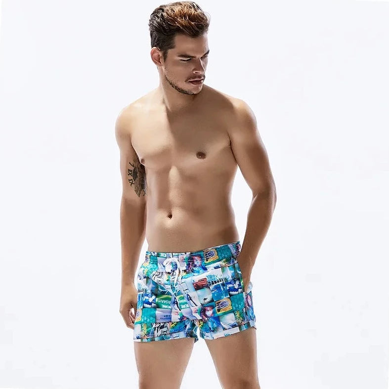 a hot gay man in blue Postcard Grid Board Shorts - pridevoyageshop.com - gay men’s underwear and swimwear