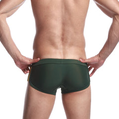 a sexy gay man in green Men's Athletic Square Cut Swim Trunks - pridevoyageshop.com - gay men’s underwear and swimwear