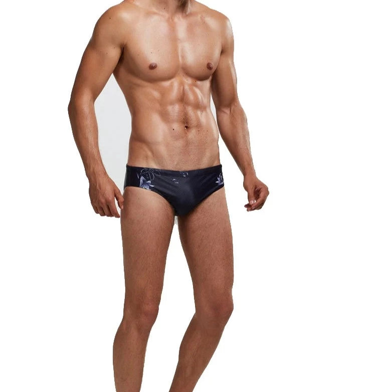 a sexy gay man in Men's Patterned Swim Briefs - pridevoyageshop.com - gay men’s underwear and swimwear