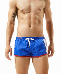 sexy gay man in blue Gay Shorts | Seobean Mens Gym Shorts - Men's Activewear, gym short, sport shorts, running shorts- pridevoyageshop.com