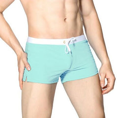 Cyan Best Men's Swim Shorts: Tight Swim Trunks for a Stylish Summer- pridevoyageshop.com - gay men’s harness, lingerie and fetish wear