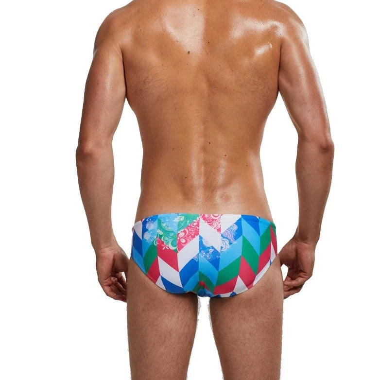 a sexy gay man in Men's Patterned Swim Briefs - pridevoyageshop.com - gay men’s underwear and swimwear