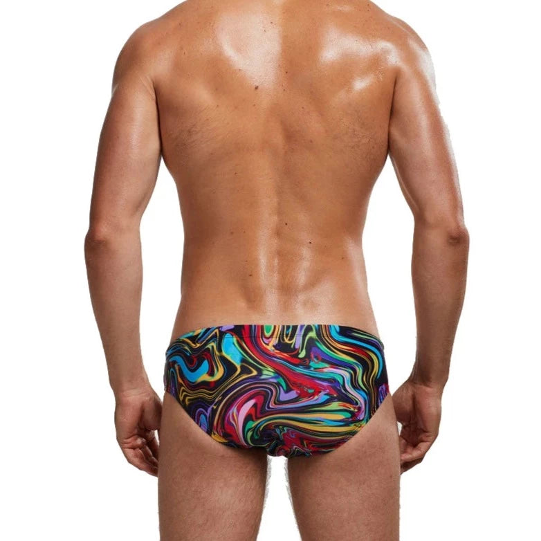 a sexy gay man in Men's Patterned Swim Briefs - pridevoyageshop.com - gay men’s underwear and swimwear