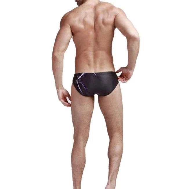 a sexy gay man in Men's Patterned Swim Briefs - pridevoyageshop.com - gay men’s underwear and swimwear