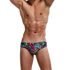 a sexy gay man in Men's Patterned Swim Briefs - pridevoyageshop.com - gay men’s underwear and swimwear