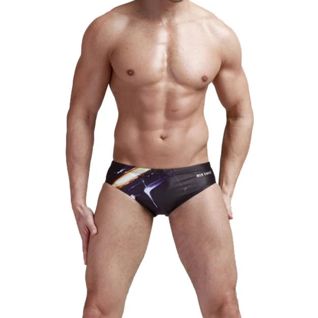 a sexy gay man in Men's Patterned Swim Briefs - pridevoyageshop.com - gay men’s underwear and swimwear
