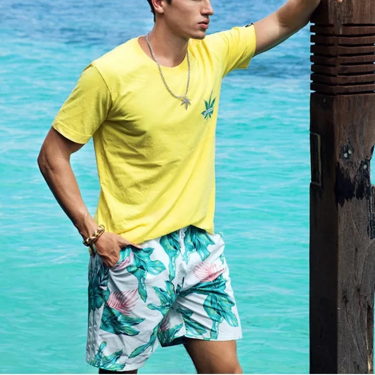 a handsome gay guy in Breeze Bloom Board Shorts - pridevoyageshop.com - gay men’s underwear and swimwear