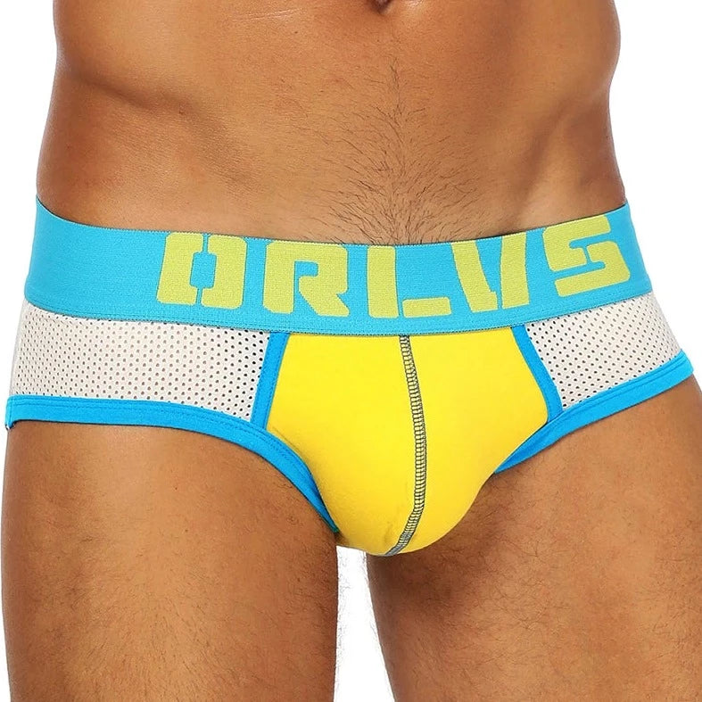 a hot gay man in yellow ORLVS Bold Color See Throu Mesh Briefs - pridevoyageshop.com - gay men’s underwear and swimwear