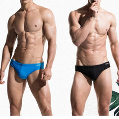 a sexy gay man in DESMIIT Solid Color Swim Briefs - pridevoyageshop.com - gay men’s underwear and swimwear