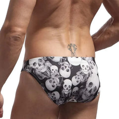 a hot gay man in black Men's Skinny Skull Print Swim Briefs - pridevoyageshop.com - gay men’s underwear and swimwear