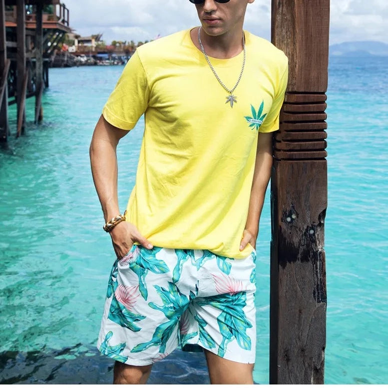 a handsome gay guy in Breeze Bloom Board Shorts - pridevoyageshop.com - gay men’s underwear and swimwear