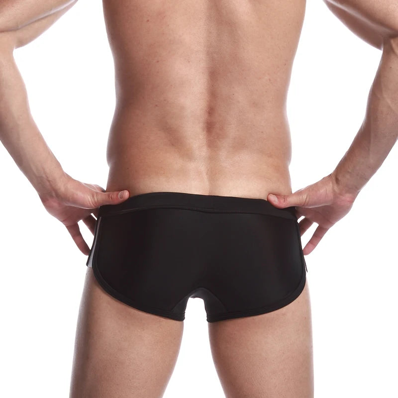 a sexy gay man in black Men's Athletic Square Cut Swim Trunks - pridevoyageshop.com - gay men’s underwear and swimwear