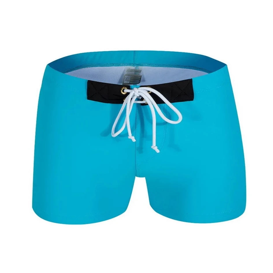 lake blue Solid Color Bowtie Swim Trunks - pridevoyageshop.com - gay men’s underwear and swimwear