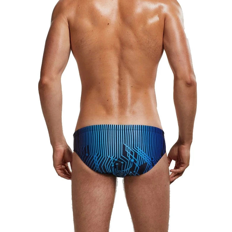 a sexy gay man in Men's Patterned Swim Briefs - pridevoyageshop.com - gay men’s underwear and swimwear