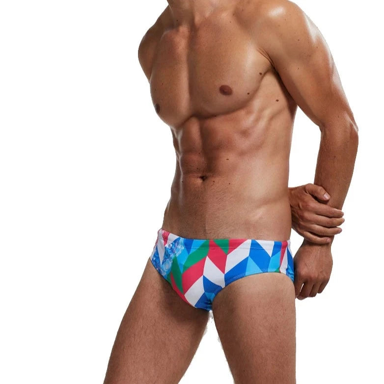 a sexy gay man in Men's Patterned Swim Briefs - pridevoyageshop.com - gay men’s underwear and swimwear
