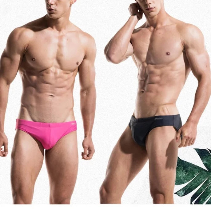 a sexy gay man in DESMIIT Solid Color Swim Briefs - pridevoyageshop.com - gay men’s underwear and swimwear