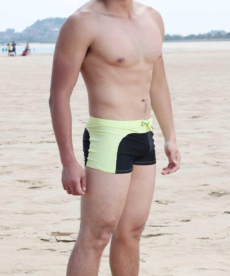 hot gay man in black and yellow Gay Swimwear & Beachwear | Quick Dry Aqua Shape Swim Trunks - pridevoyageshop.com - gay men’s underwear and swimwear