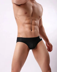 a hot gay man in black Brave Person Badge See Through Briefs - pridevoyageshop.com - gay men’s underwear and swimwear